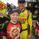 Illustration for article titled 11-year-old boy dying from leukemia drives race car em/em